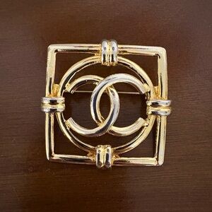 Vintage gold tone Chanel cc brooch